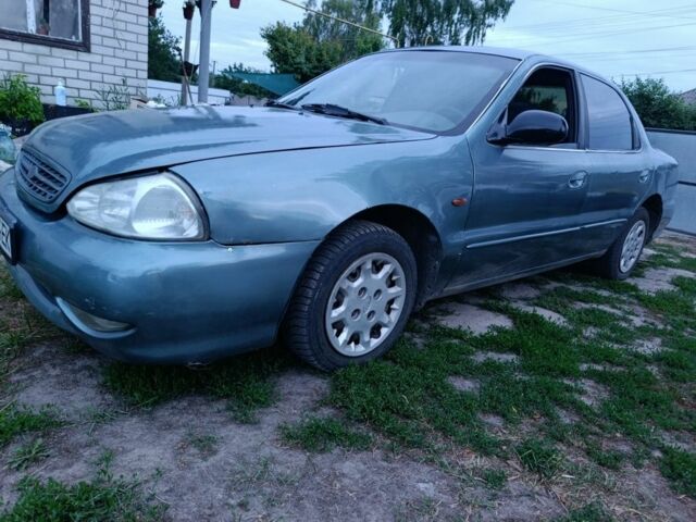 Сірий Кіа Кларус, об'ємом двигуна 2 л та пробігом 358 тис. км за 2256 $, фото 1 на Automoto.ua