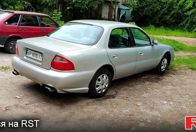 Сірий Кіа Кларус, об'ємом двигуна 2 л та пробігом 310 тис. км за 1500 $, фото 1 на Automoto.ua