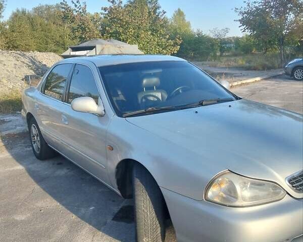 Серый Киа Кларус, объемом двигателя 2 л и пробегом 352 тыс. км за 2000 $, фото 1 на Automoto.ua