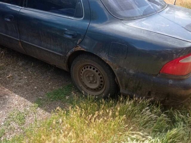 Сірий Кіа Кларус, об'ємом двигуна 2 л та пробігом 300 тис. км за 1300 $, фото 1 на Automoto.ua