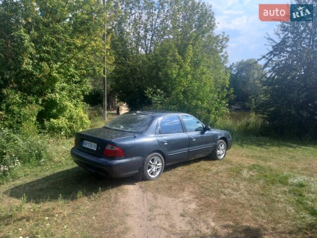 Сірий Кіа Кларус, об'ємом двигуна 2 л та пробігом 294 тис. км за 1800 $, фото 1 на Automoto.ua