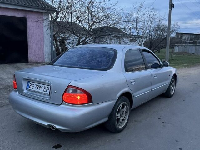Серый Киа Кларус, объемом двигателя 2 л и пробегом 240 тыс. км за 1400 $, фото 1 на Automoto.ua