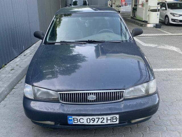 Синий Киа Кларус, объемом двигателя 2 л и пробегом 360 тыс. км за 2250 $, фото 1 на Automoto.ua