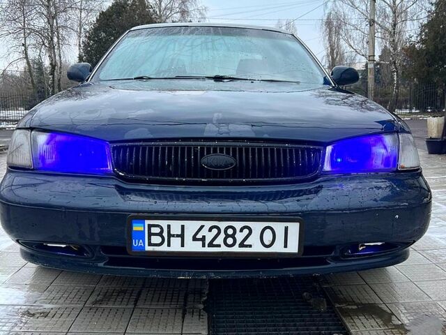 Синій Кіа Кларус, об'ємом двигуна 2 л та пробігом 400 тис. км за 1500 $, фото 1 на Automoto.ua