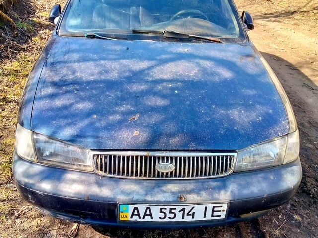 Синій Кіа Кларус, об'ємом двигуна 2 л та пробігом 200 тис. км за 850 $, фото 1 на Automoto.ua