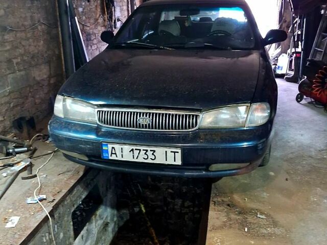 Синій Кіа Кларус, об'ємом двигуна 2 л та пробігом 270 тис. км за 2500 $, фото 1 на Automoto.ua