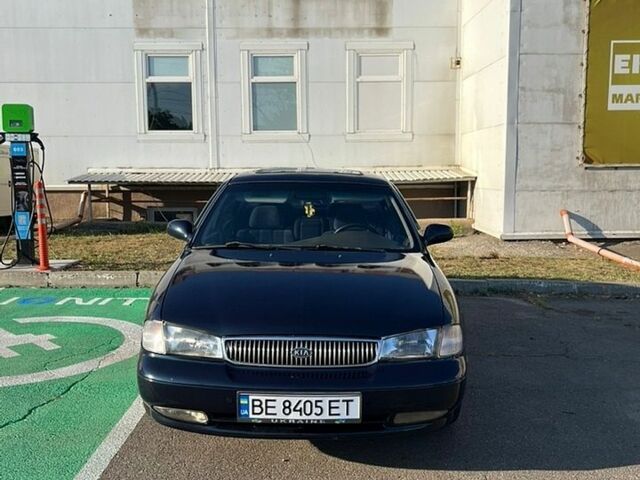 Синій Кіа Кларус, об'ємом двигуна 2 л та пробігом 285 тис. км за 2200 $, фото 1 на Automoto.ua