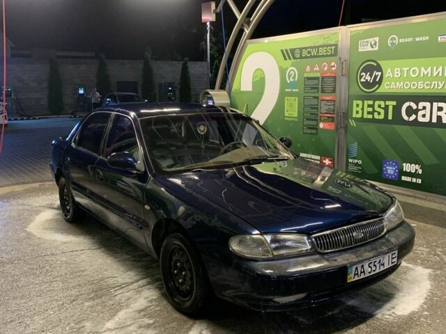 Синій Кіа Кларус, об'ємом двигуна 2 л та пробігом 100 тис. км за 1500 $, фото 1 на Automoto.ua