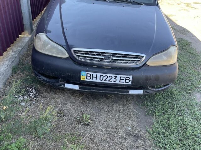 Синий Киа Кларус, объемом двигателя 2 л и пробегом 300 тыс. км за 950 $, фото 1 на Automoto.ua