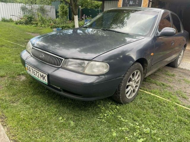 Синій Кіа Кларус, об'ємом двигуна 2 л та пробігом 301 тис. км за 1650 $, фото 1 на Automoto.ua