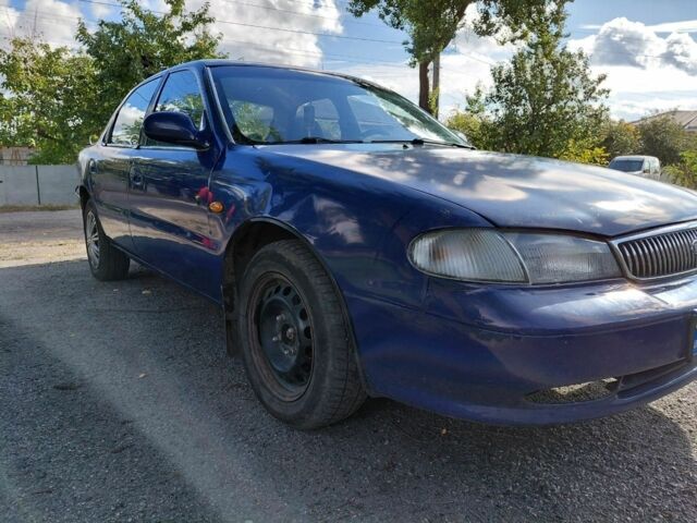 Синій Кіа Кларус, об'ємом двигуна 2 л та пробігом 256 тис. км за 951 $, фото 1 на Automoto.ua