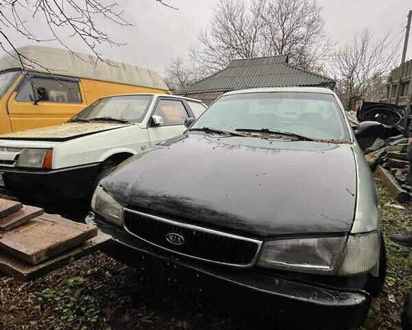 Зелений Кіа Кларус, об'ємом двигуна 1.9 л та пробігом 200 тис. км за 1400 $, фото 1 на Automoto.ua