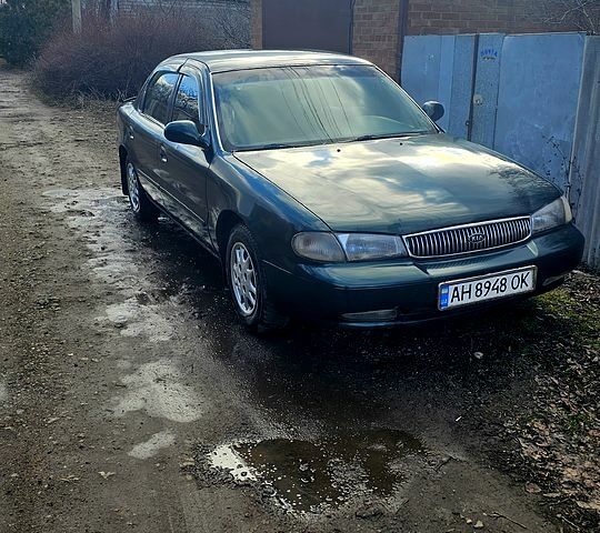 Зеленый Киа Кларус, объемом двигателя 20 л и пробегом 350 тыс. км за 2200 $, фото 1 на Automoto.ua