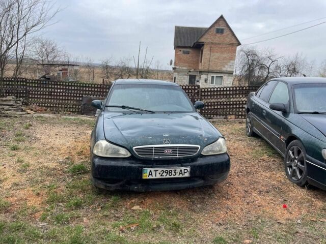 Зеленый Киа Кларус, объемом двигателя 2 л и пробегом 200 тыс. км за 850 $, фото 1 на Automoto.ua