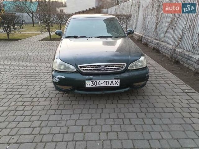 Зеленый Киа Кларус, объемом двигателя 2 л и пробегом 400 тыс. км за 1399 $, фото 1 на Automoto.ua