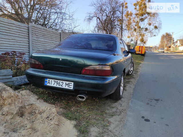 Зелений Кіа Кларус, об'ємом двигуна 2 л та пробігом 330 тис. км за 2500 $, фото 1 на Automoto.ua