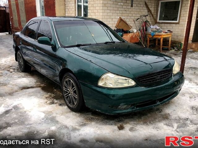 Зеленый Киа Кларус, объемом двигателя 1.8 л и пробегом 300 тыс. км за 2000 $, фото 1 на Automoto.ua