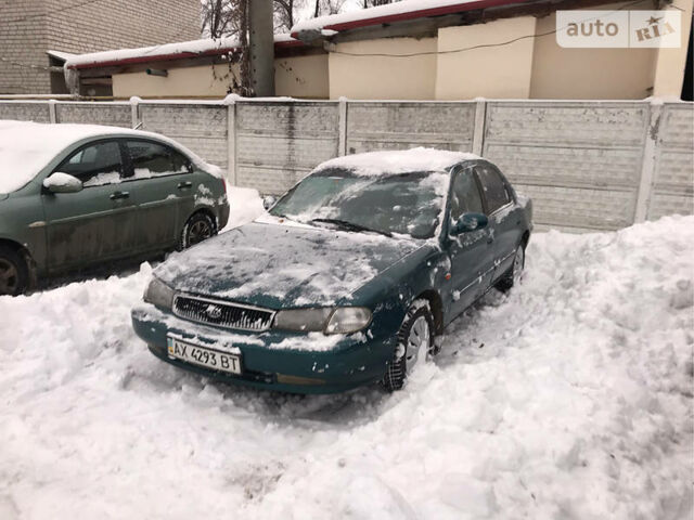 Зелений Кіа Кларус, об'ємом двигуна 1.8 л та пробігом 200 тис. км за 2100 $, фото 1 на Automoto.ua