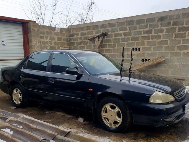 Киа Кредос, объемом двигателя 2 л и пробегом 315 тыс. км за 900 $, фото 1 на Automoto.ua
