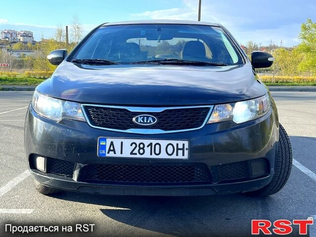 Черный Киа Форте, объемом двигателя 2 л и пробегом 325 тыс. км за 7000 $, фото 1 на Automoto.ua