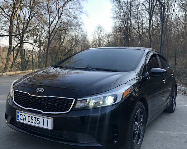 Чорний Кіа Форте, об'ємом двигуна 2 л та пробігом 150 тис. км за 12200 $, фото 1 на Automoto.ua