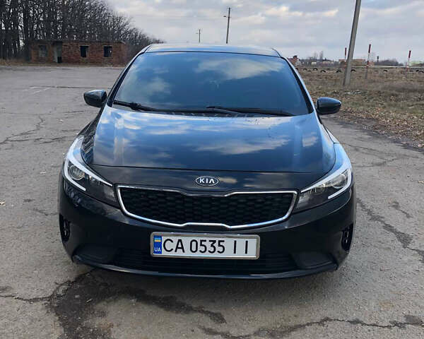 Черный Киа Форте, объемом двигателя 2 л и пробегом 155 тыс. км за 10800 $, фото 1 на Automoto.ua