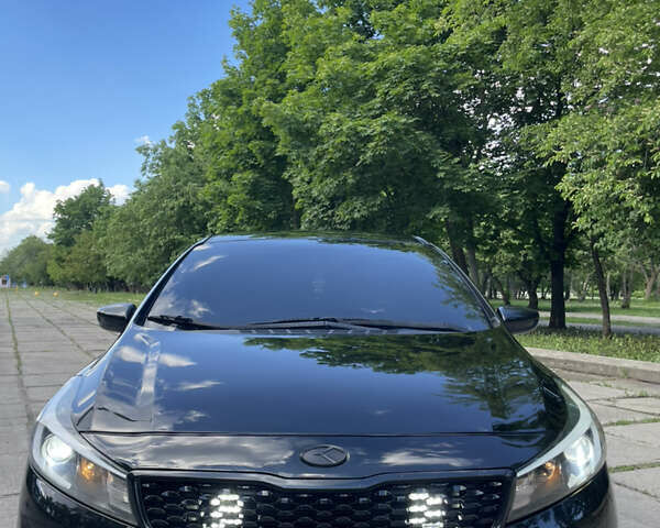 Чорний Кіа Форте, об'ємом двигуна 2 л та пробігом 168 тис. км за 10400 $, фото 1 на Automoto.ua