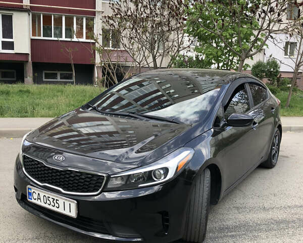 Черный Киа Форте, объемом двигателя 2 л и пробегом 157 тыс. км за 10400 $, фото 1 на Automoto.ua