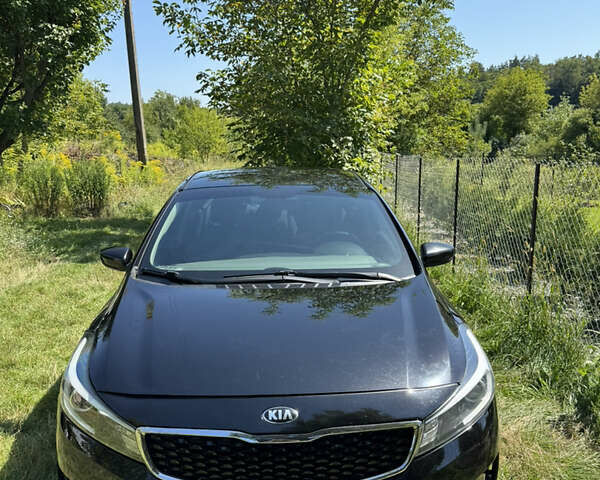 Чорний Кіа Форте, об'ємом двигуна 2 л та пробігом 66 тис. км за 11500 $, фото 1 на Automoto.ua