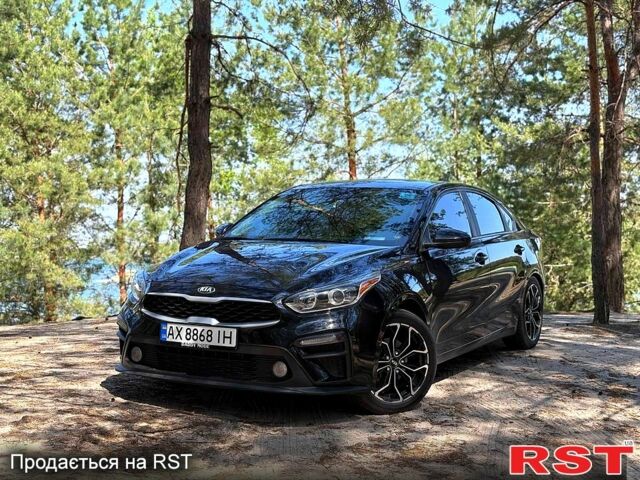 Чорний Кіа Форте, об'ємом двигуна 2 л та пробігом 83 тис. км за 14800 $, фото 1 на Automoto.ua