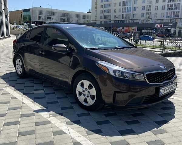 Коричневий Кіа Форте, об'ємом двигуна 2 л та пробігом 137 тис. км за 10300 $, фото 1 на Automoto.ua