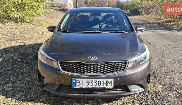 Коричневый Киа Форте, объемом двигателя 2 л и пробегом 46 тыс. км за 13000 $, фото 1 на Automoto.ua
