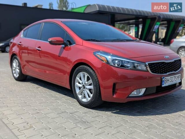 Красный Киа Форте, объемом двигателя 2 л и пробегом 97 тыс. км за 11850 $, фото 1 на Automoto.ua