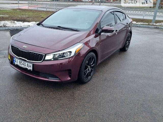 Красный Киа Форте, объемом двигателя 2 л и пробегом 170 тыс. км за 9500 $, фото 1 на Automoto.ua