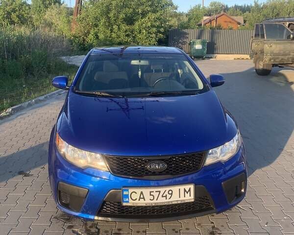 Синий Киа Форте, объемом двигателя 2 л и пробегом 260 тыс. км за 7999 $, фото 1 на Automoto.ua