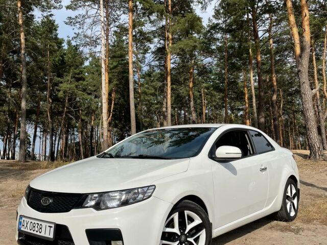 Белый Киа Коуп, объемом двигателя 2 л и пробегом 180 тыс. км за 8500 $, фото 1 на Automoto.ua