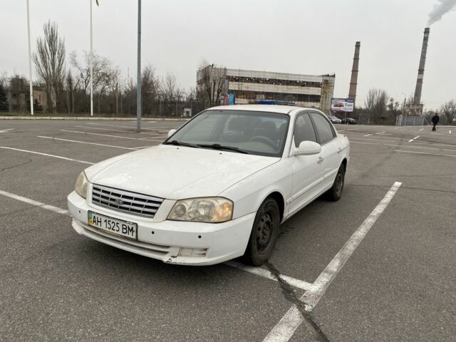 Білий Кіа Маджентіс, об'ємом двигуна 2 л та пробігом 220 тис. км за 1950 $, фото 1 на Automoto.ua