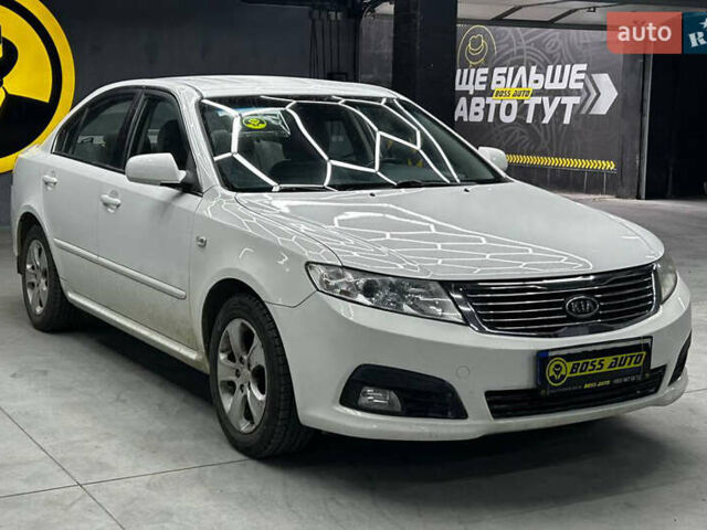 Білий Кіа Маджентіс, об'ємом двигуна 2 л та пробігом 163 тис. км за 6800 $, фото 1 на Automoto.ua