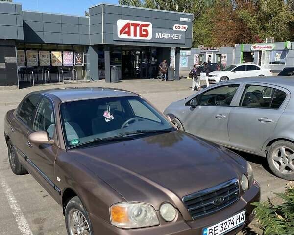 Бежевый Киа Маджентис, объемом двигателя 2 л и пробегом 160 тыс. км за 2400 $, фото 1 на Automoto.ua