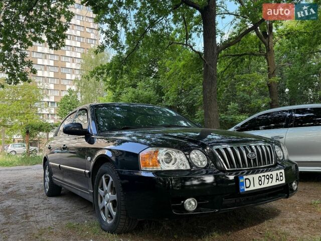 Чорний Кіа Маджентіс, об'ємом двигуна 2 л та пробігом 164 тис. км за 4300 $, фото 1 на Automoto.ua