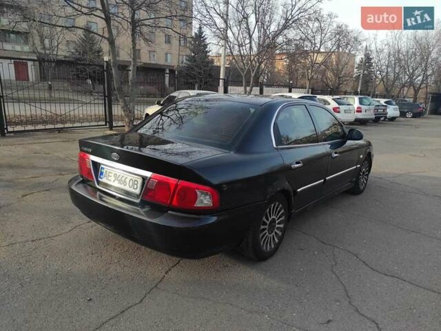 Черный Киа Маджентис, объемом двигателя 2 л и пробегом 136 тыс. км за 1664 $, фото 1 на Automoto.ua