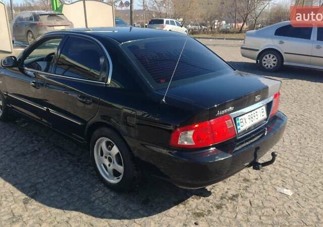 Черный Киа Маджентис, объемом двигателя 2 л и пробегом 275 тыс. км за 3400 $, фото 1 на Automoto.ua