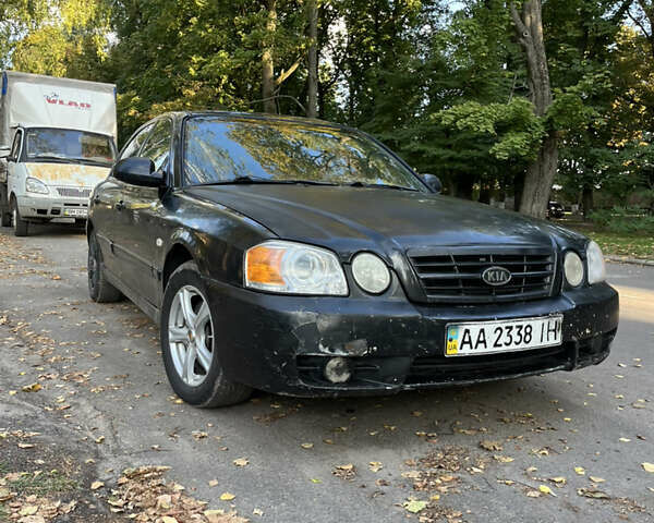 Черный Киа Маджентис, объемом двигателя 2 л и пробегом 455 тыс. км за 2800 $, фото 1 на Automoto.ua