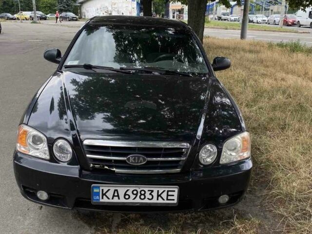 Черный Киа Маджентис, объемом двигателя 2 л и пробегом 300 тыс. км за 2500 $, фото 1 на Automoto.ua