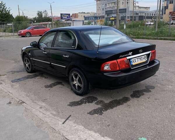 Чорний Кіа Маджентіс, об'ємом двигуна 1.99 л та пробігом 247 тис. км за 3500 $, фото 1 на Automoto.ua