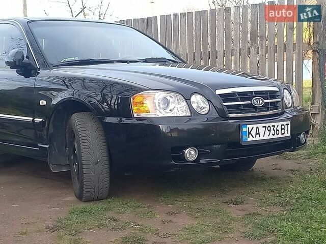 Черный Киа Маджентис, объемом двигателя 2 л и пробегом 273 тыс. км за 3100 $, фото 1 на Automoto.ua