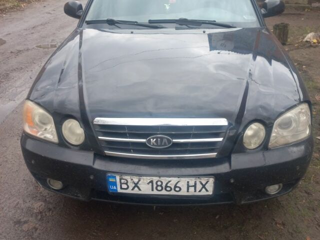 Черный Киа Маджентис, объемом двигателя 2 л и пробегом 315 тыс. км за 2499 $, фото 1 на Automoto.ua
