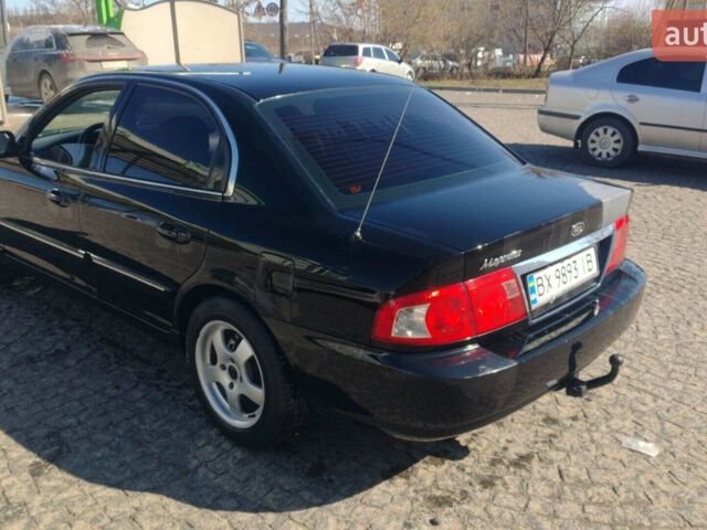 Черный Киа Маджентис, объемом двигателя 2 л и пробегом 275 тыс. км за 2200 $, фото 1 на Automoto.ua