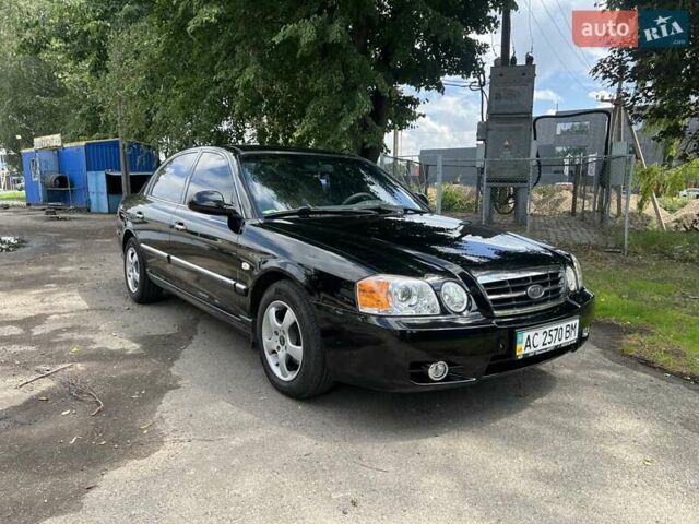 Чорний Кіа Маджентіс, об'ємом двигуна 2 л та пробігом 72 тис. км за 5600 $, фото 1 на Automoto.ua