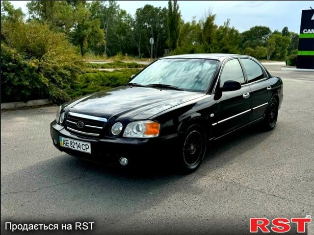 Черный Киа Маджентис, объемом двигателя 2 л и пробегом 260 тыс. км за 4500 $, фото 1 на Automoto.ua